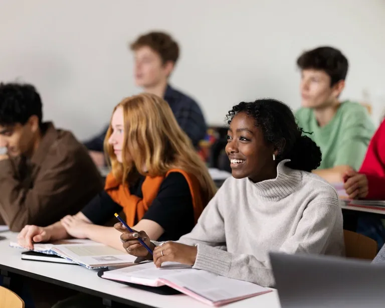 carousel-diverse-students-listening-in-classroom