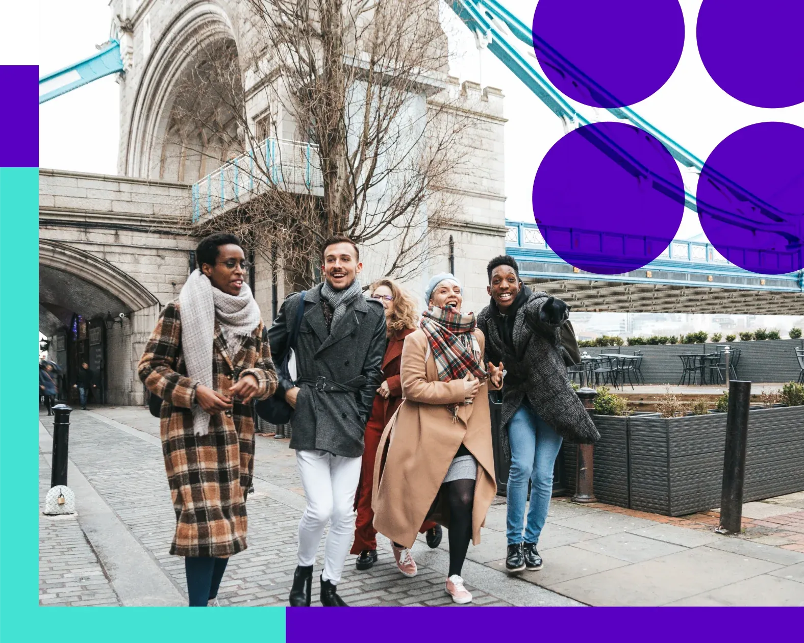 Group of friends walking in London street in front of London bridge