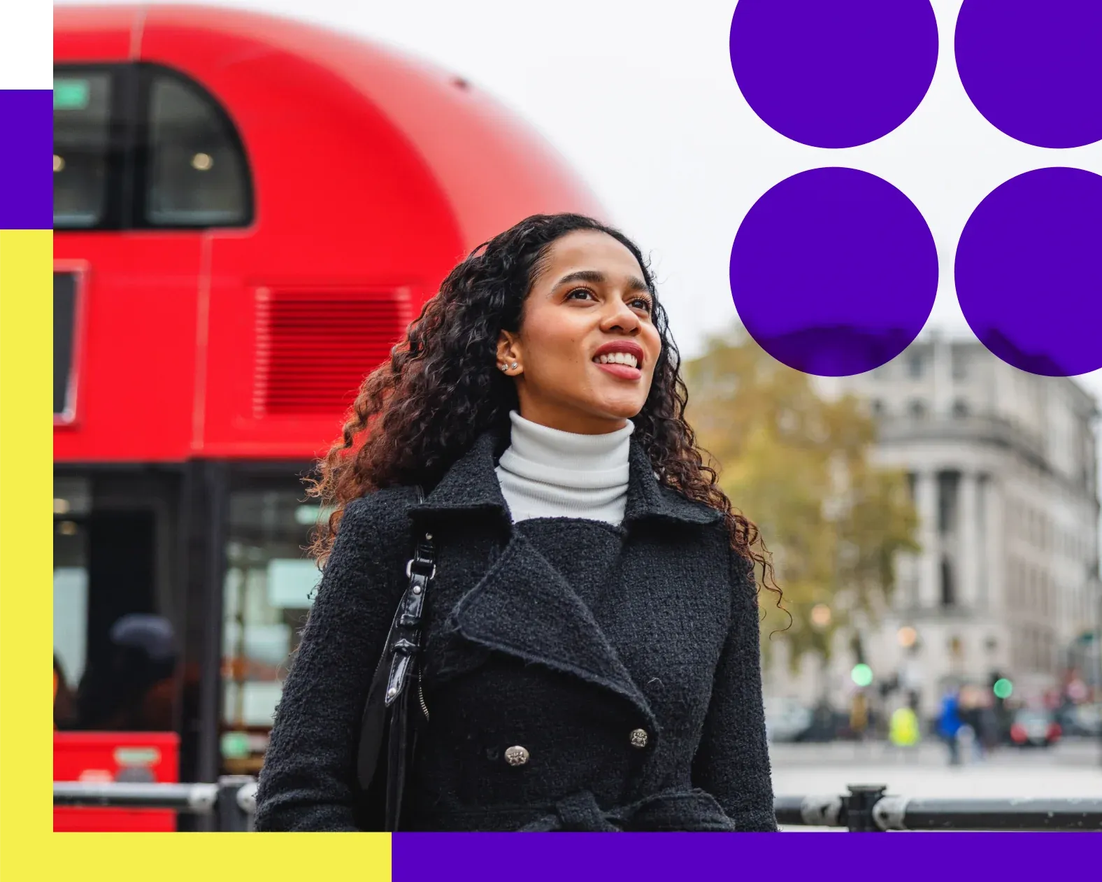 Woman smiling in front of a London city bus