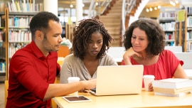 Students look at the computer screen