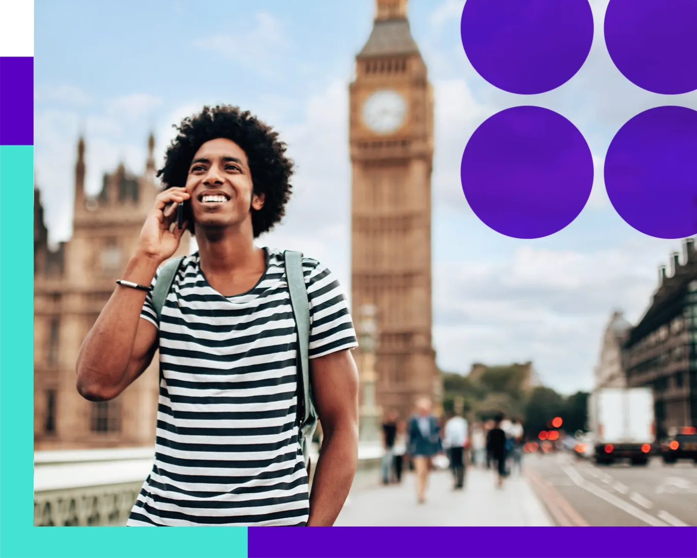 A curly hair man talking on phone happily after giving IELTS exam