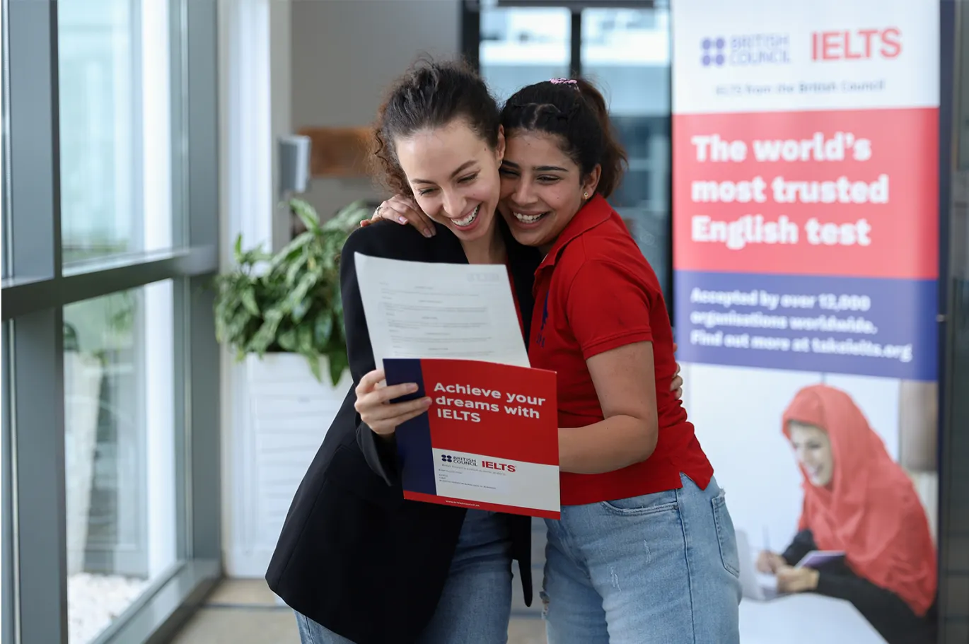 Students celebrating faster IELTS results