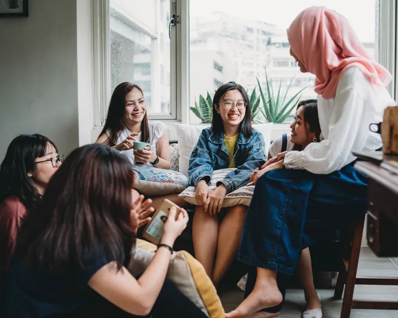 group-girls-discussing-ielts-study-materials